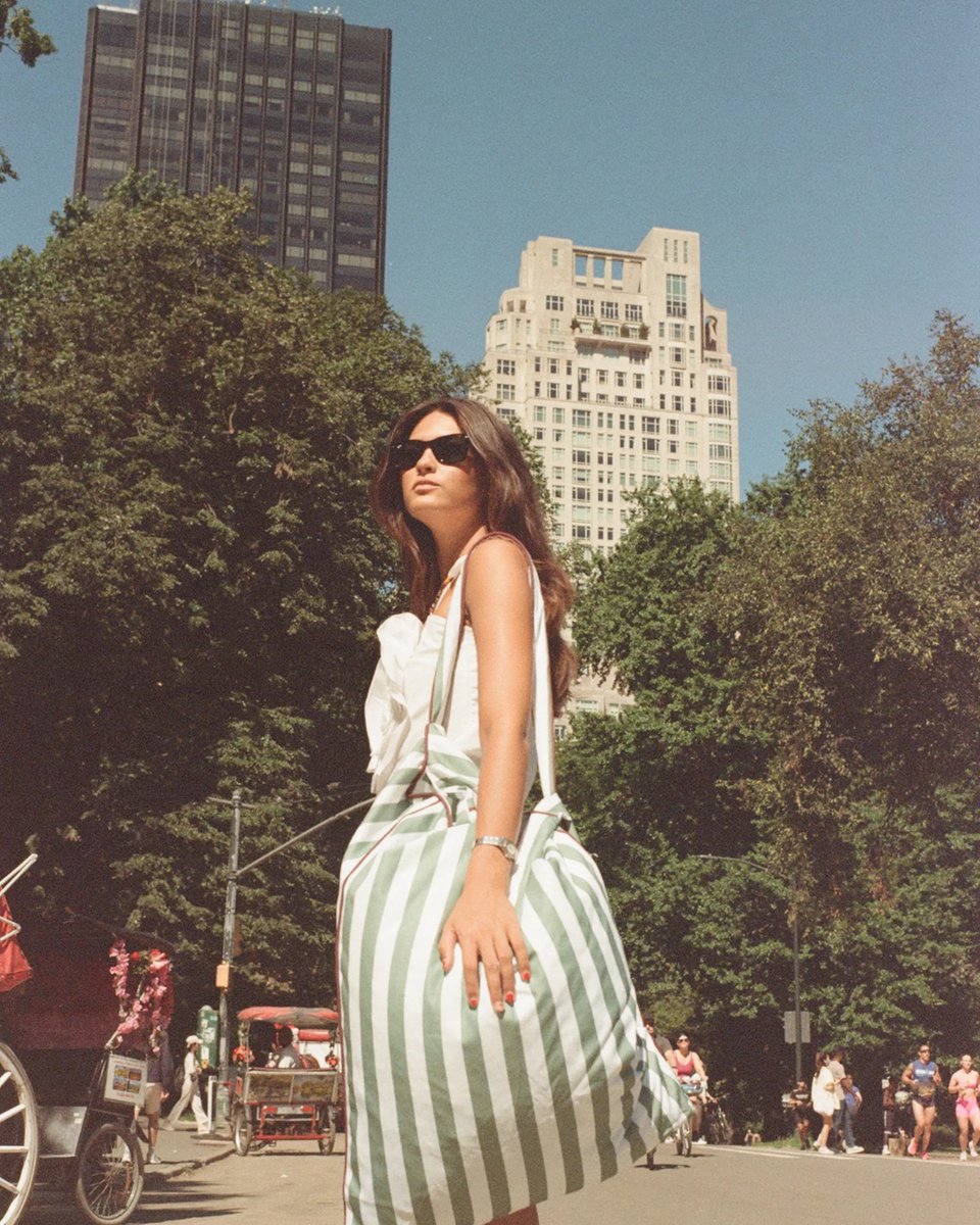 Tribeca backrest carried over the shoulder at the edge of Central Park