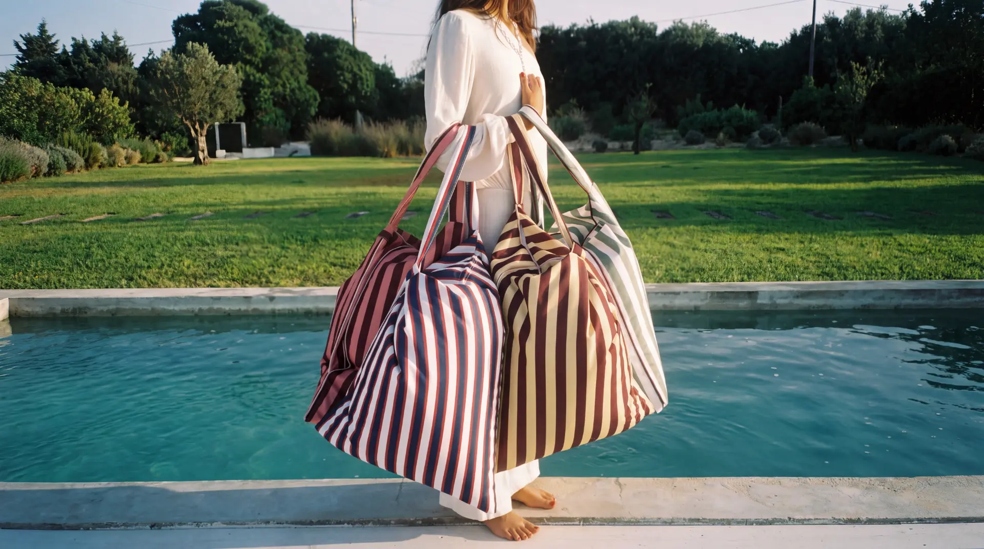 LIELOW — four colorways stacked, model behind a terracotta backdrop