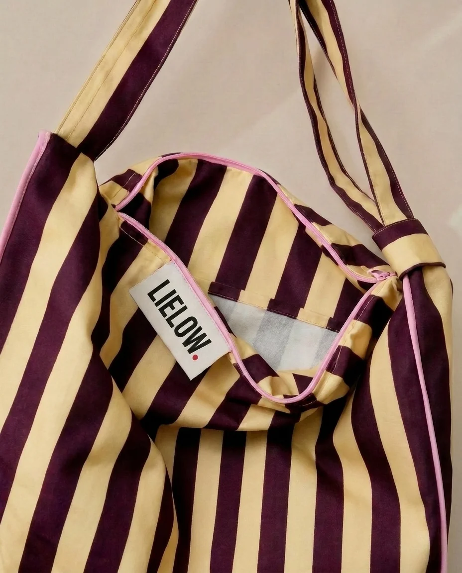 Lielow Pier 55 — close-up of LIELOW label, straps and pink piping