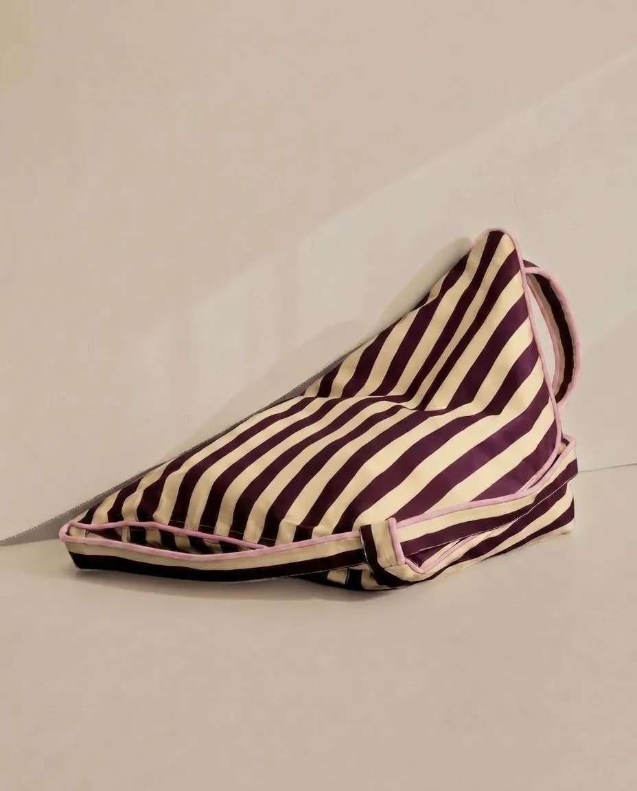 Lielow Pier 55 — striped bag flattened into chair form