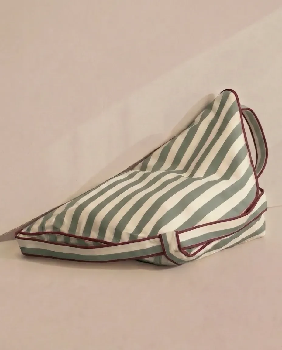 Lielow Tribeca — sage and cream striped bag flattened into chair form with burgundy piping